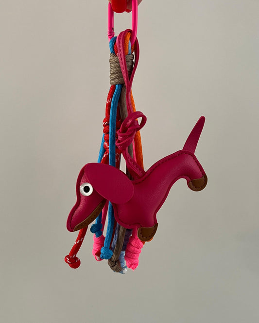 Adorno Teckel fucsia